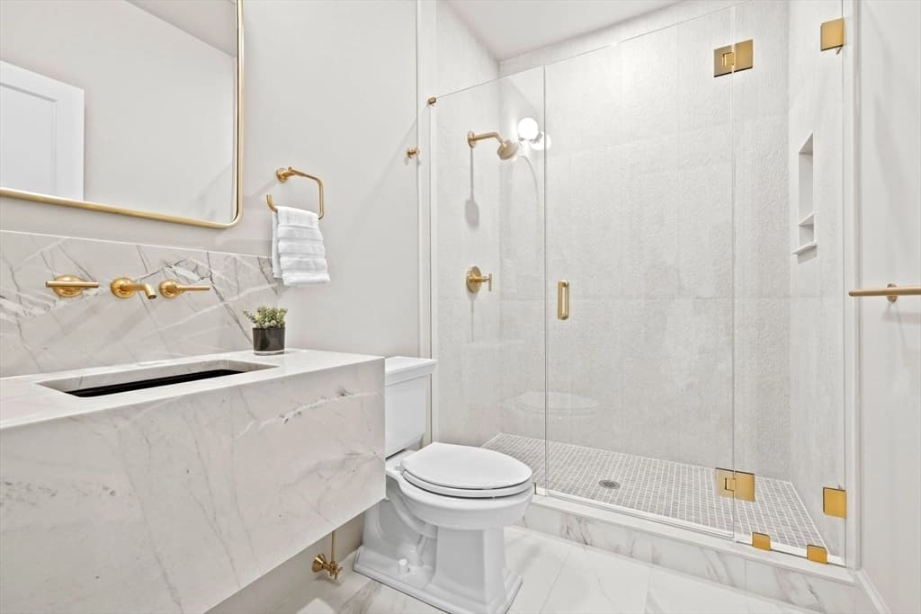 White quartz vanity with wall faucets and apron — Lexington, MA